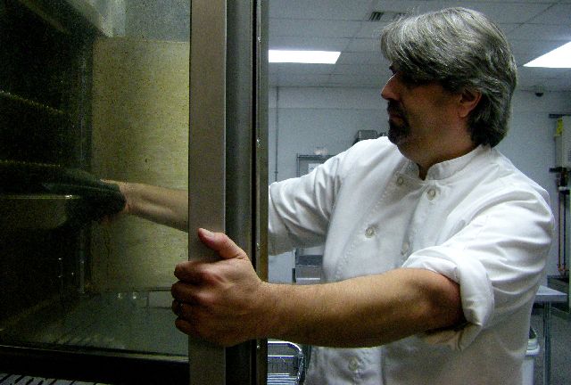 Tom at work in the kitchen