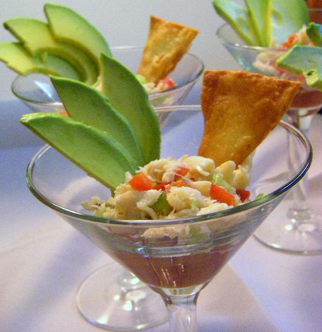 Sweet, lump crab meat with our house-made cocktail sauce elegantly displayed in a martini glass