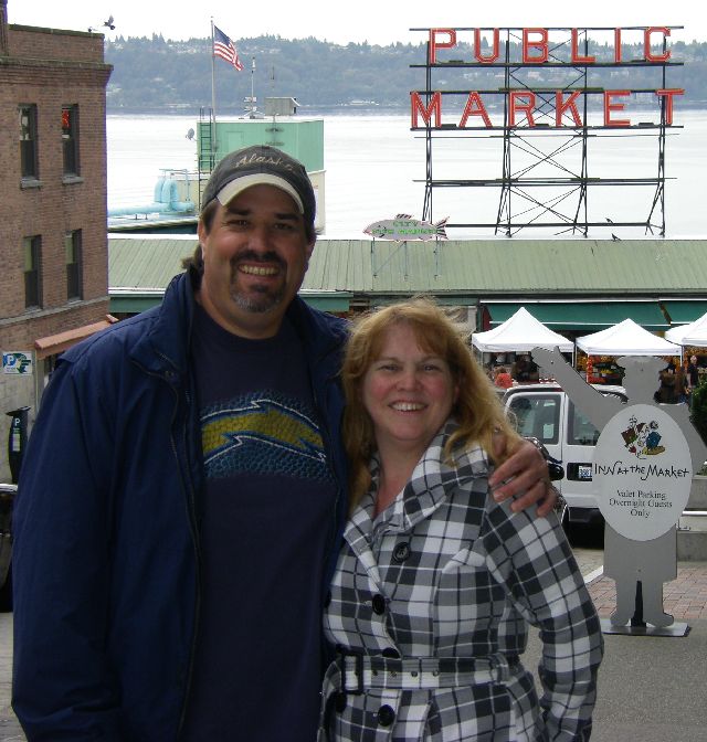 Tom and Michelle in front of Pike Place Market